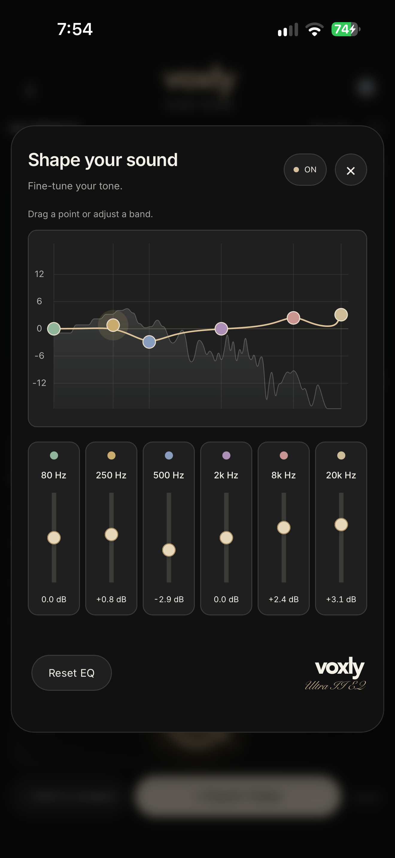 Actual VOXLY iPhone EQ screen with six colored bands, frequency spectrum and gain sliders